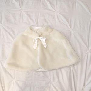 A white dressy cape for girls.